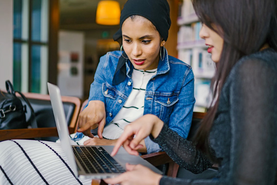 Women around a computer